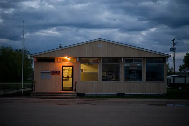 Village Office and post office at dusk