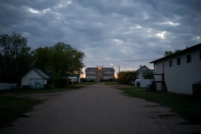 Street leading to the old brick school at dusk